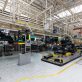 Automobile production line. Modern car assembly plant. Interior of a high-tech factory, manufacturing.