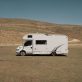 House on wheels. RV - recreational vehicle trailer on camping in the mountains